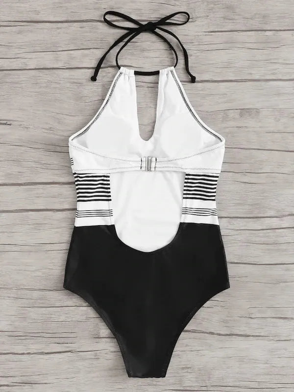 Black striped one-piece swimsuit for women made from nylon fabric, front view