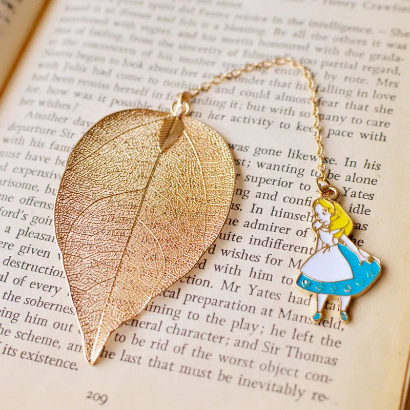Kraft paper bookmark with kc alloy Alice, rabbit, clock, and leaf charms on cardboard backing