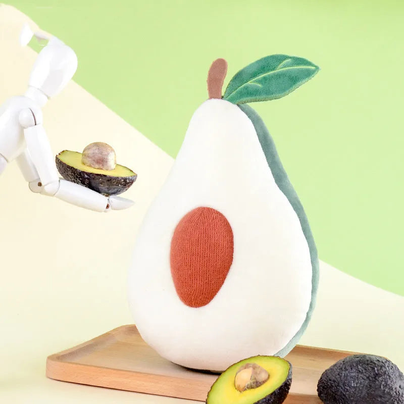 Soft plush fruit pillow toy in peach colour, with sweet expression, made of cotton