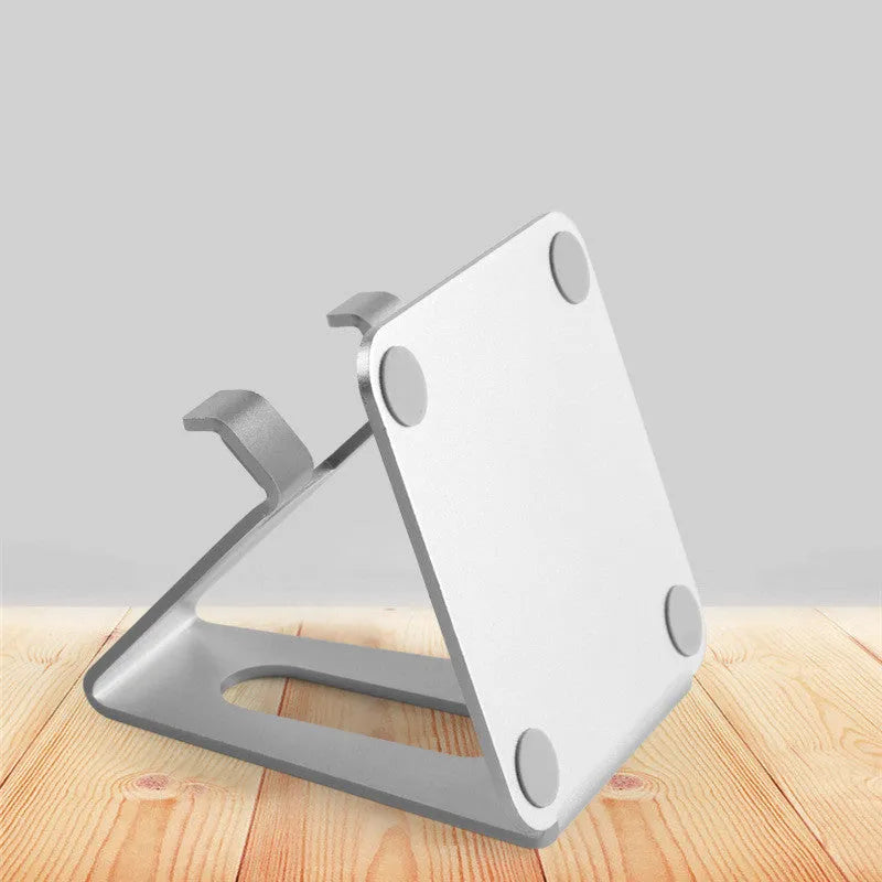 Adjustable metal desktop mobile phone holder in black with device inserted, compatible with all phone brands