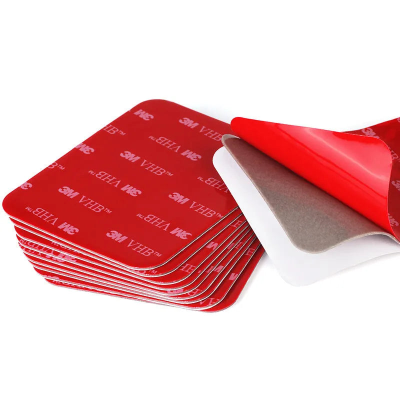 Round red PU foam double sided adhesive tape pads in various sizes on a white background