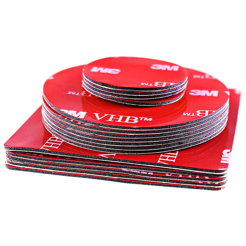 Round red PU foam double sided adhesive tape pads in various sizes on a white background