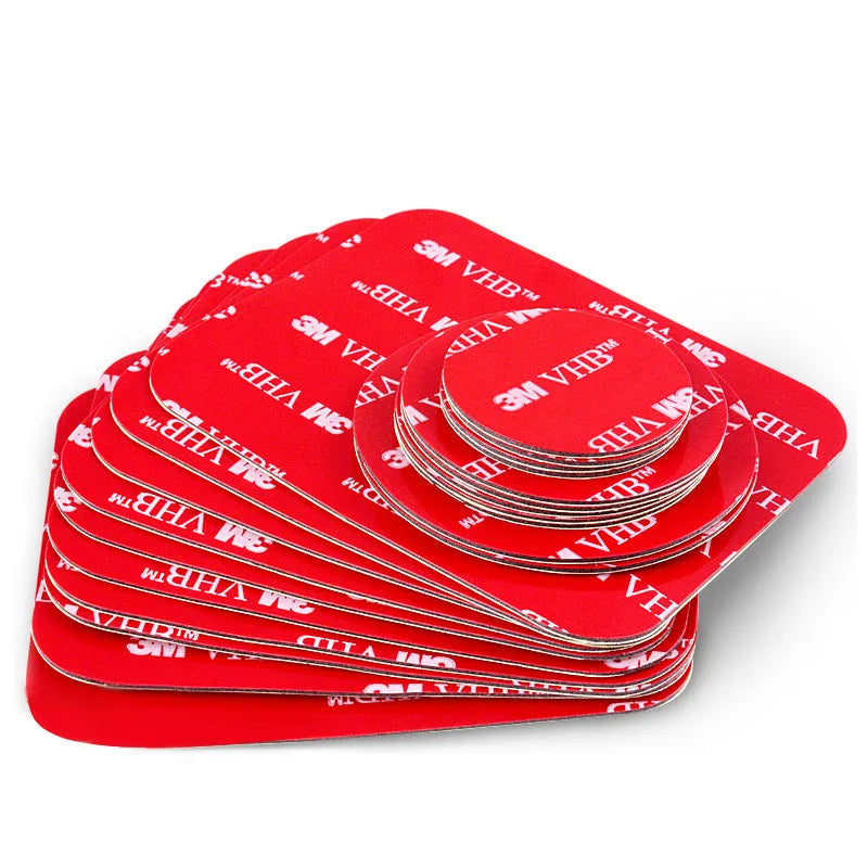 Round red PU foam double sided adhesive tape pads in various sizes on a white background