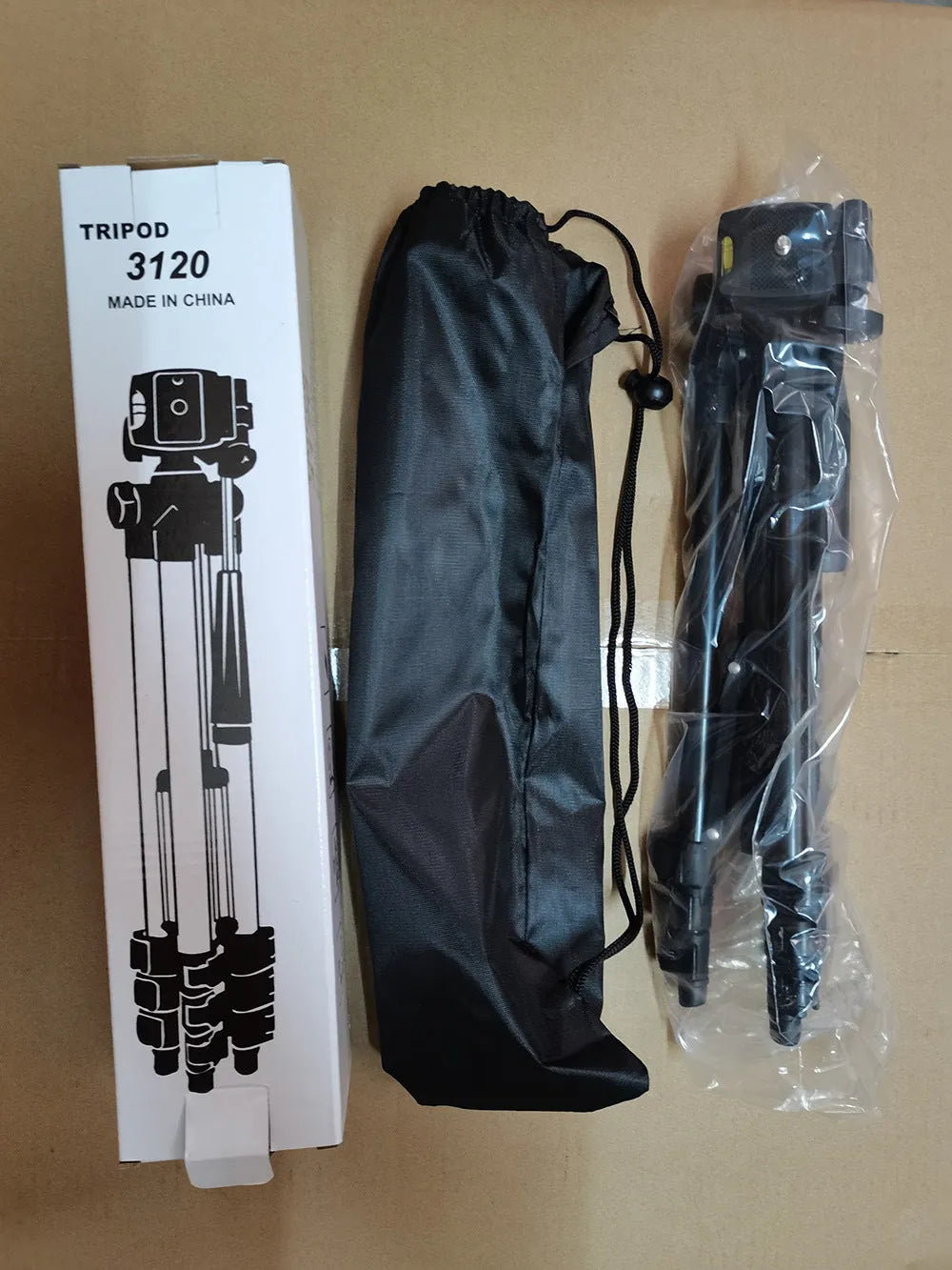 Black aluminium camera tripod with 3D head and four-section legs extended to maximum height