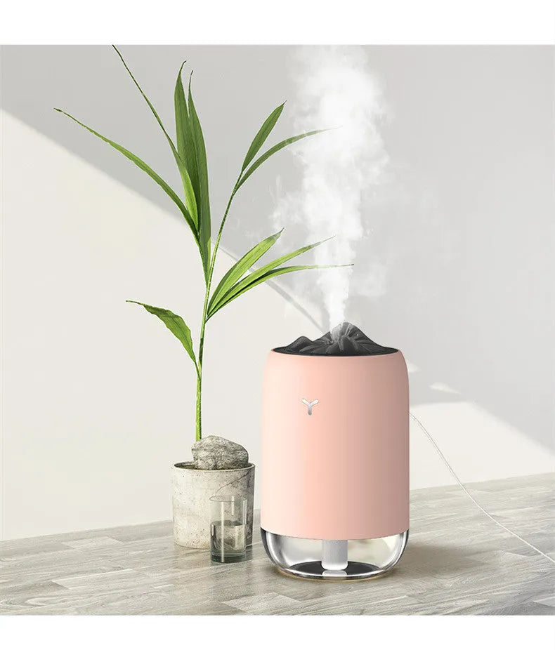 White columnar desktop humidifier with ultrasonic mist function and USB power cable