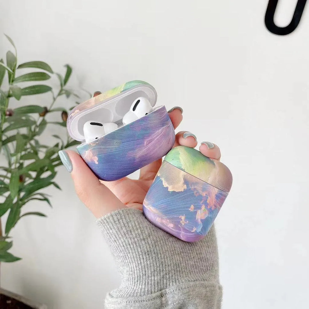 Pink watercolour hard plastic protective case for Apple AirPods with visible decorative pattern