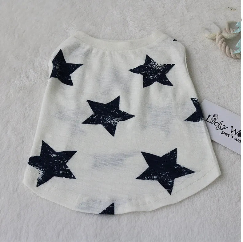 Cotton dog vest in dark blue on a small dog, showing back length and chest fit