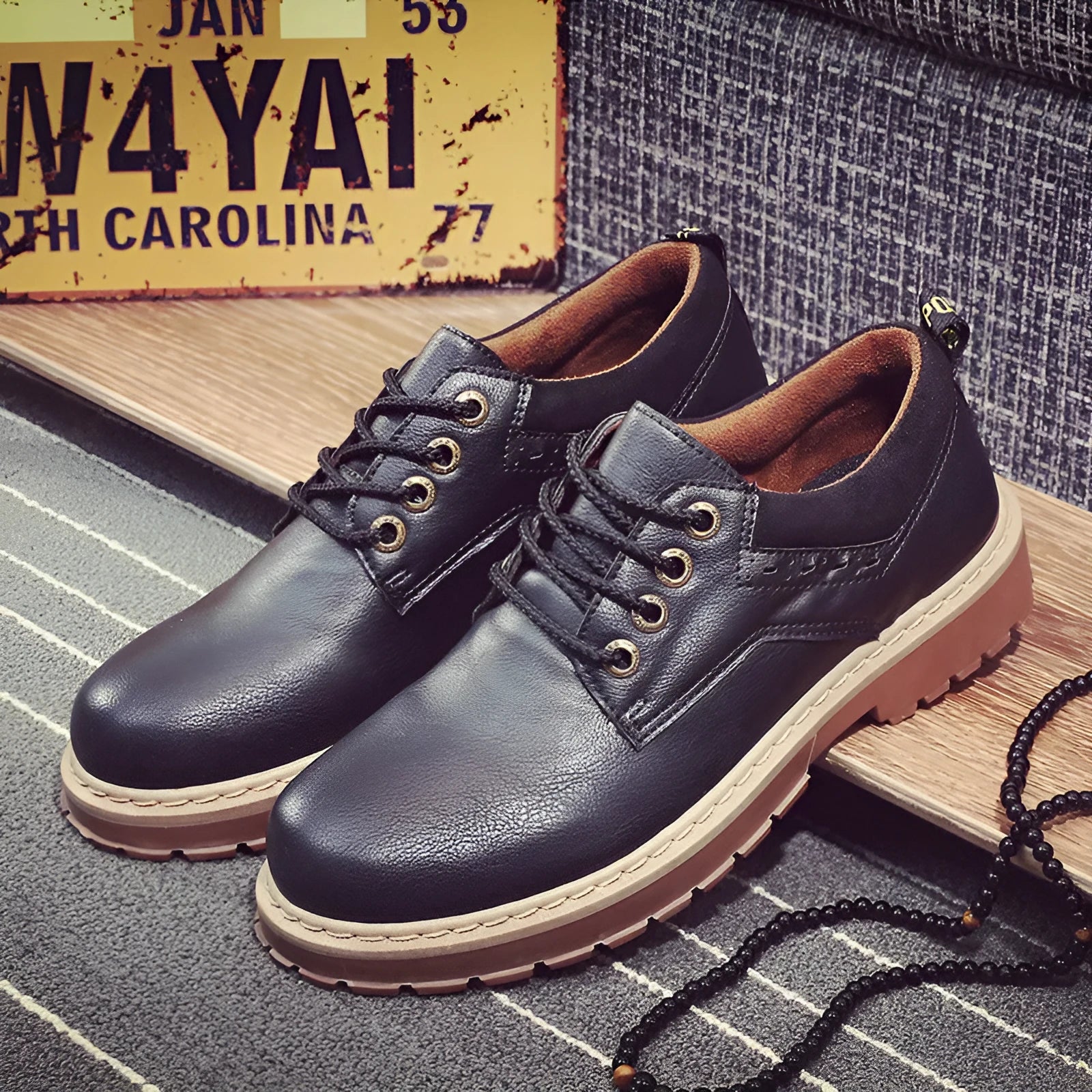 Men's brown casual derby shoes with round toe and flat rubber sole on a white background