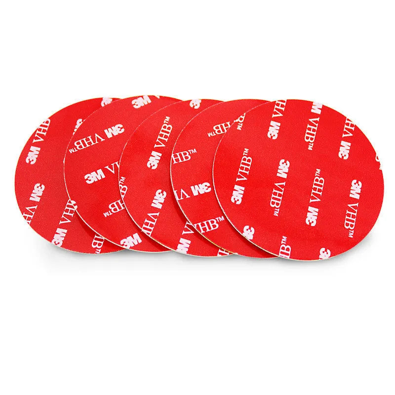 Round red PU foam double sided adhesive tape pads in various sizes on a white background