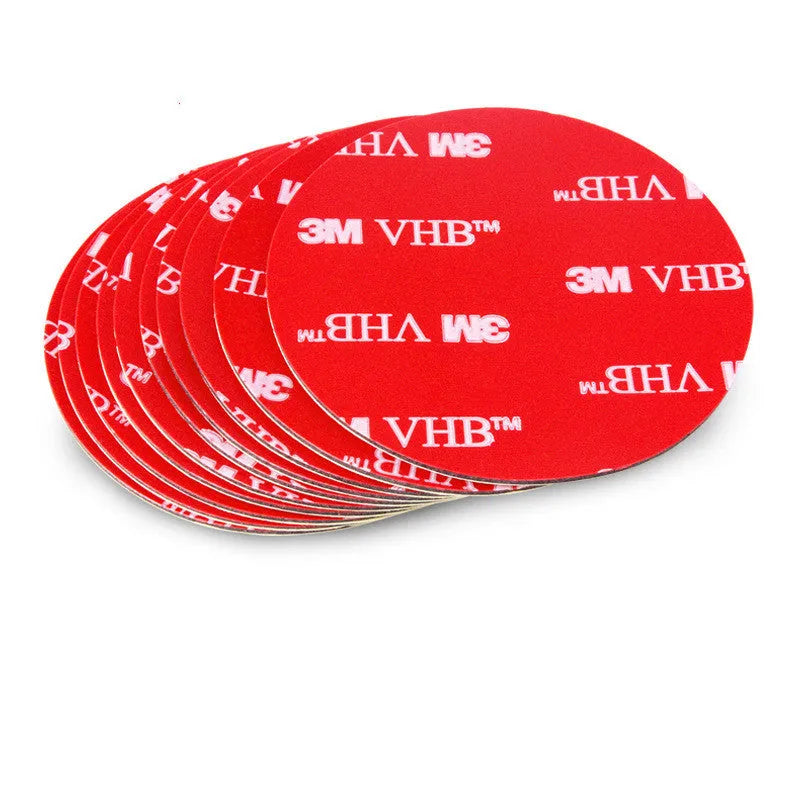 Round red PU foam double sided adhesive tape pads in various sizes on a white background