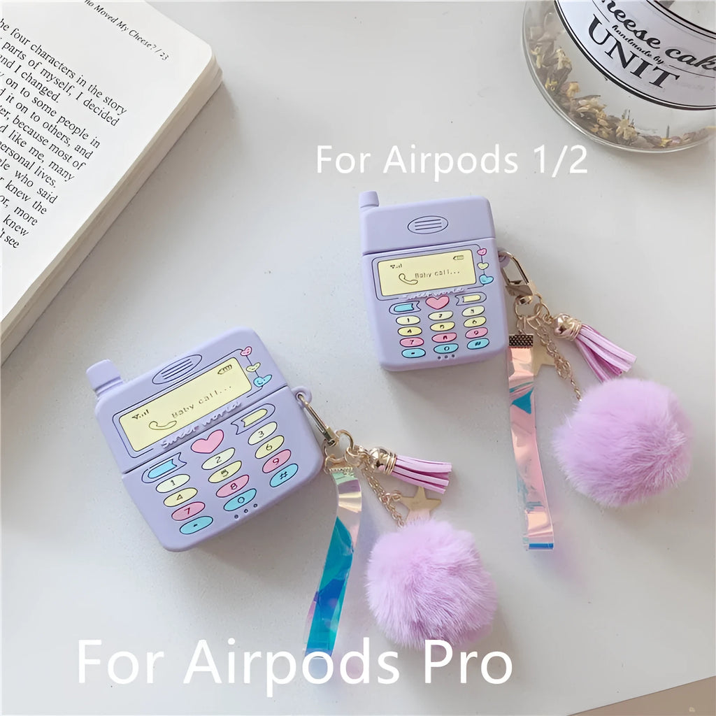 Purple silicone AirPods protective case with fluffy fur ball pendant attached