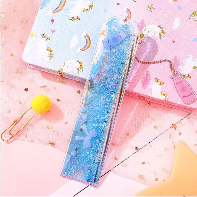 15cm quicksand oil bookmark ruler in laser PVC with cherry blossom pattern on a desk