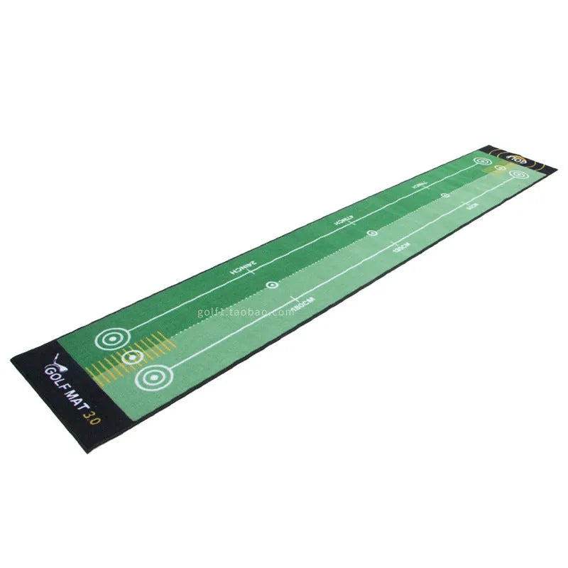 Golf putting practice blanket in green style laid on grass with a putter and ball
