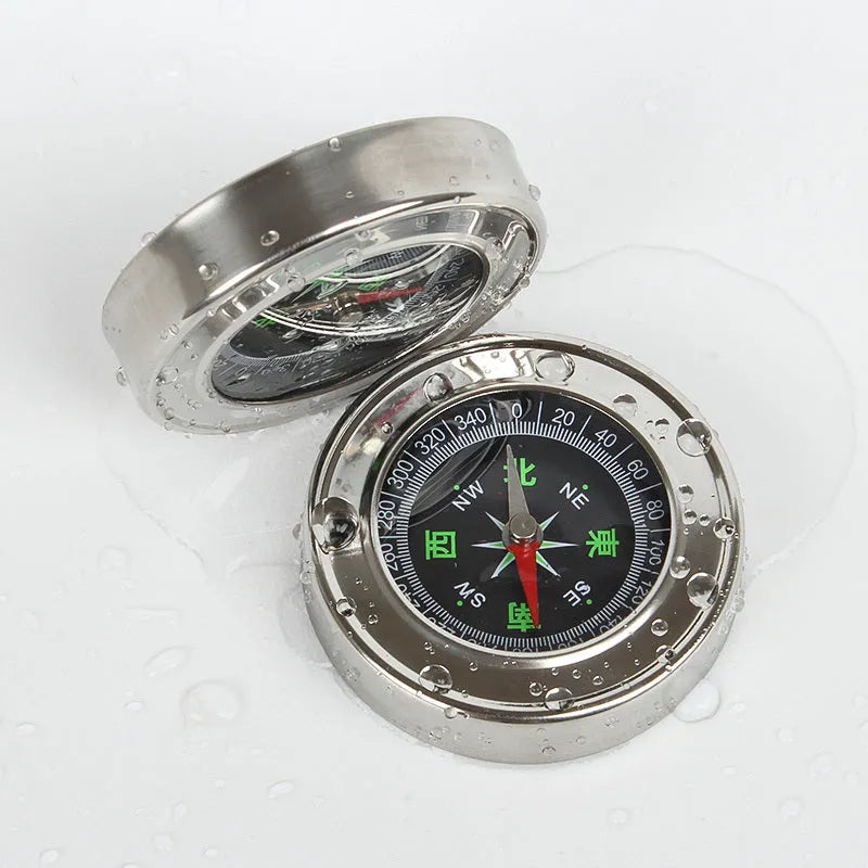 Stainless steel handheld compass for outdoor hiking and camping, white model with brushed metal body and polished base