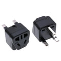 Square white and black international power adapter plug with three pins and five output sockets.