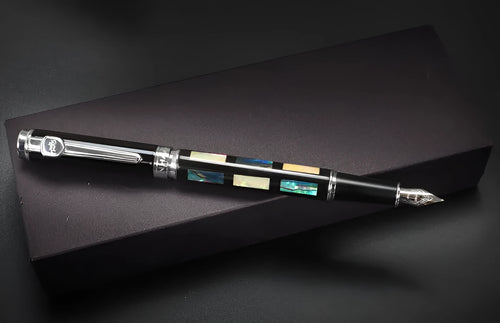 Ceramic colour lacquer pen with metal shell, rotating ink supply, and choice of three nib sizes in peach wood finish