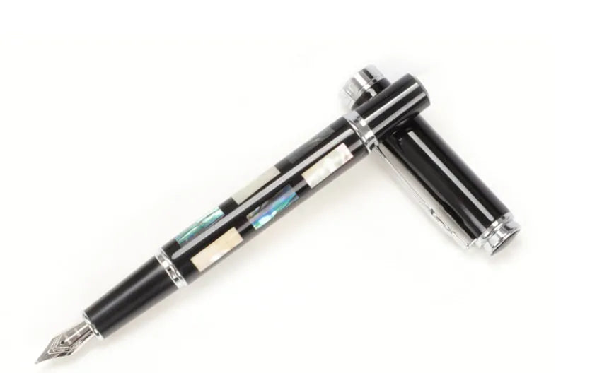 Ceramic colour lacquer pen with metal shell, rotating ink supply, and choice of three nib sizes in peach wood finish