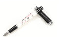 Ceramic colour lacquer pen with metal shell, rotating ink supply, and choice of three nib sizes in peach wood finish
