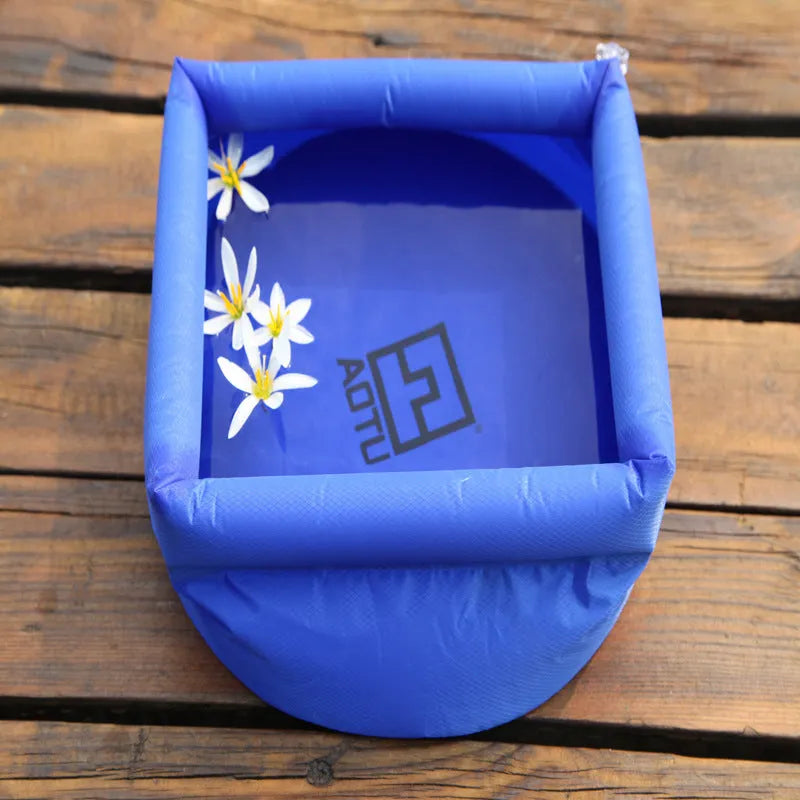 Outdoor folding washbasin bucket in blue plastic, open with 30cm diameter, showing concave-convex side design
