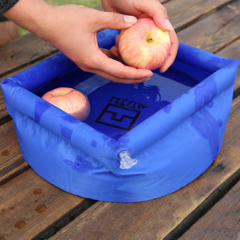 Outdoor folding washbasin bucket in blue plastic, open with 30cm diameter, showing concave-convex side design