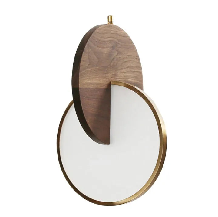 Long-line walnut wood chandelier with carved details and warm lighting