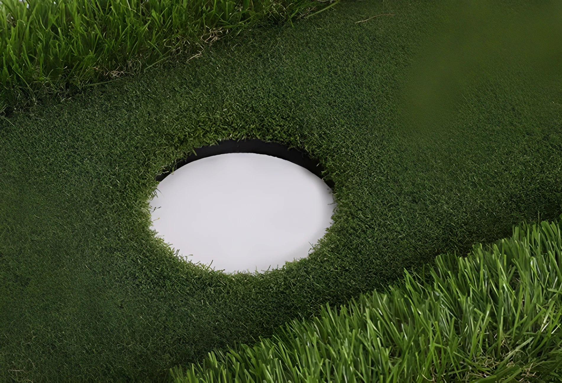 Green golf training mat showing PP grass surface texture with EVA backing