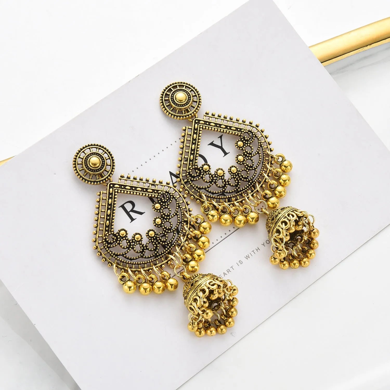 Gold bell tassel earrings with diamond lens centre and alloy inlaid artificial gemstone