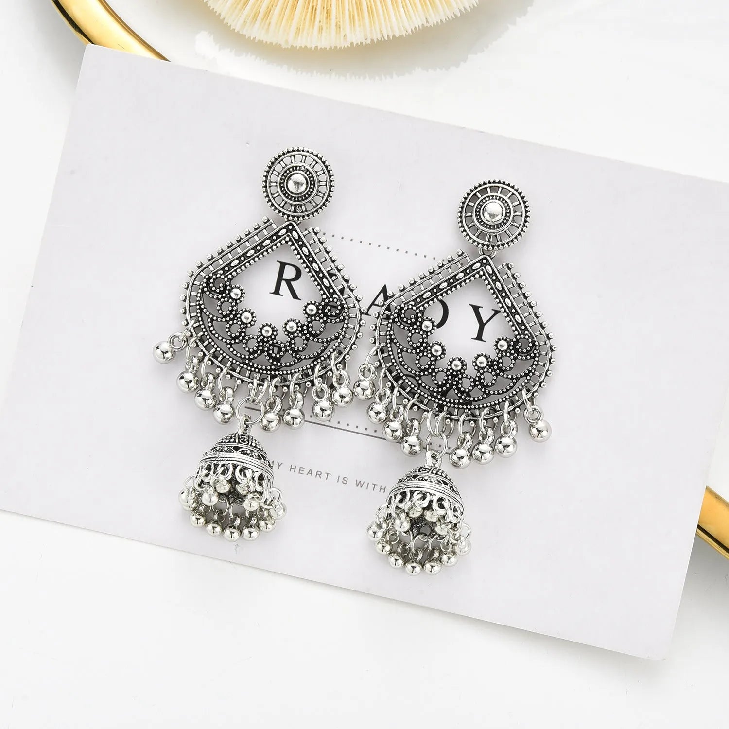 Gold bell tassel earrings with diamond lens centre and alloy inlaid artificial gemstone