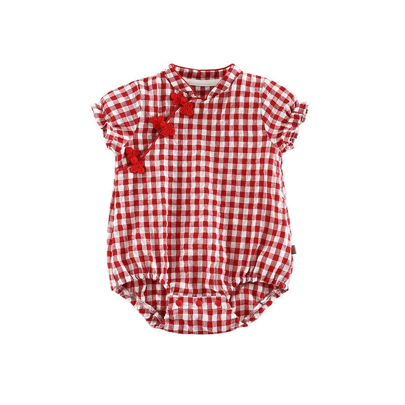 Red cotton baby cheongsam jumpsuit with short sleeves and triangle climbing design on white background