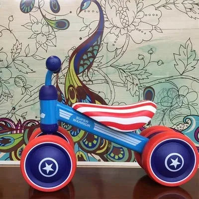 Plastic no-pedal baby balance bike with three wheels, carbon steel frame, EVA foam tyres, and artificial PU leather seat
