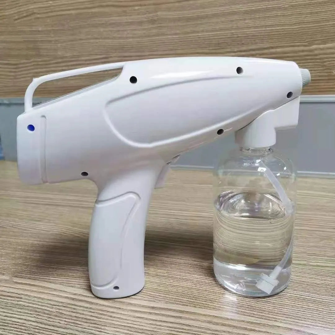White handheld wireless electric spray disinfection gun with USB Type-C port