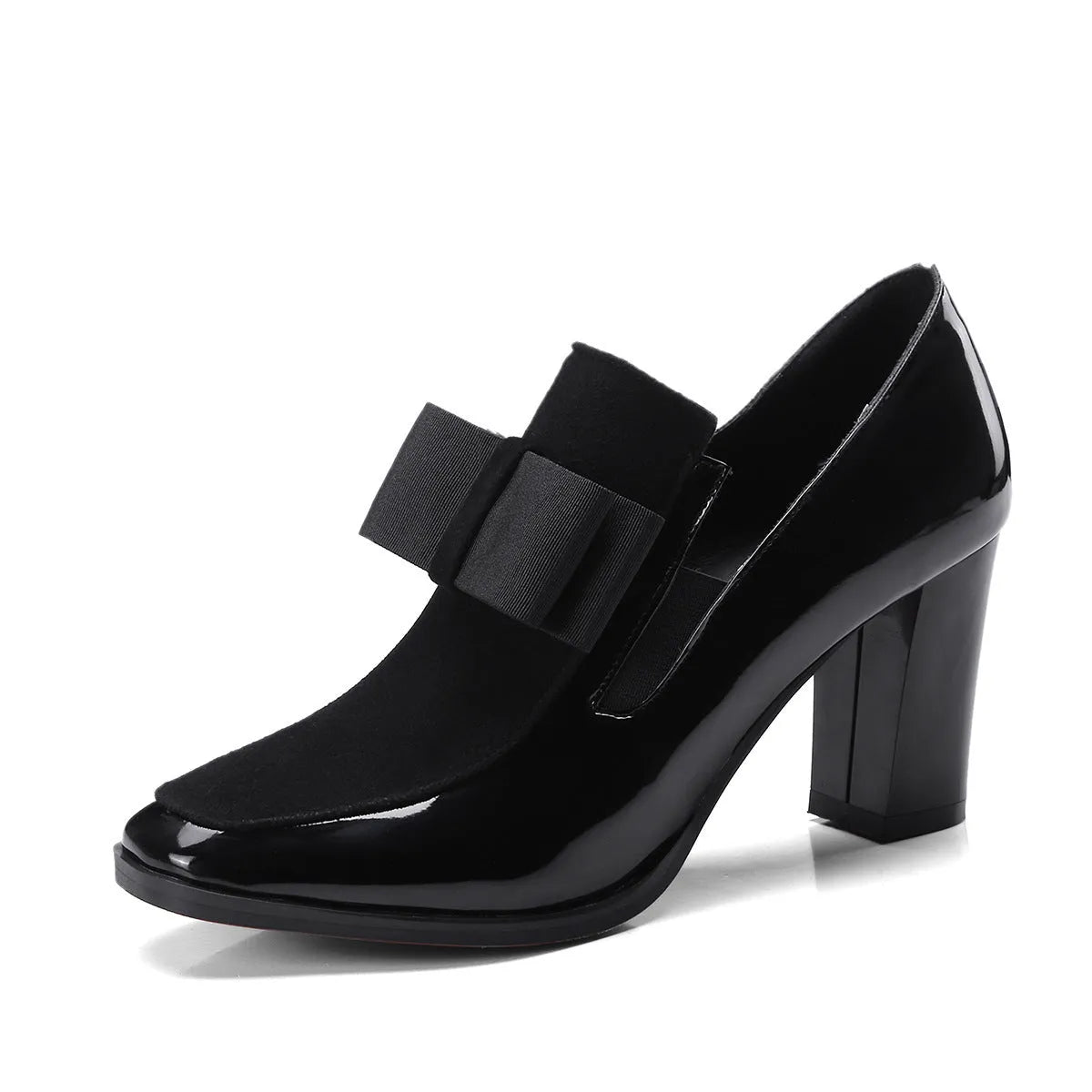 Black patent leather women's high heels with a thick chunky heel and square toe on a rubber sole.