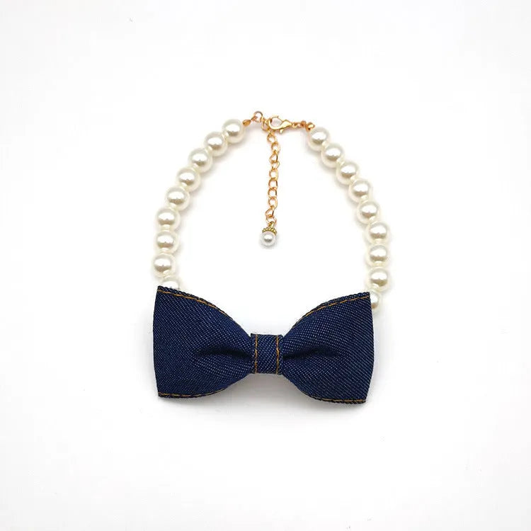 Pet necklace with denim bow and pearl pendant on a metal chain for cats and dogs in princess-style bib
