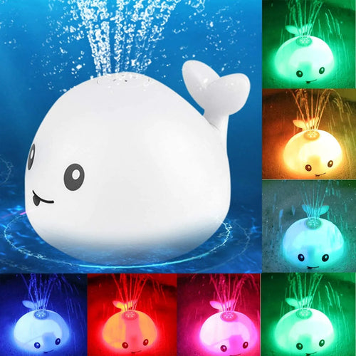 Automatic water-sensing whale bath toy with spray, lights, and music functions for baby bath time