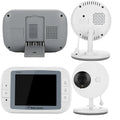 White 3.5 inch digital wireless baby monitor and UFO-style camera unit on a nursery shelf