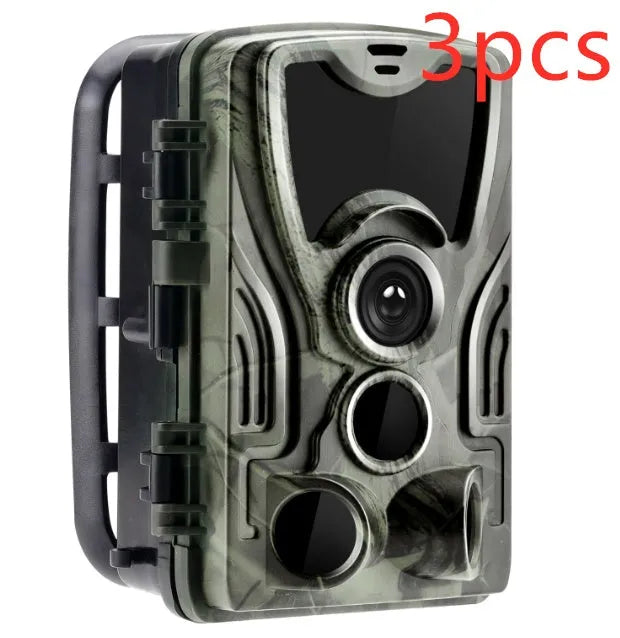 Green cellular trail hunting camera showing front view with lens, PIR sensor, and infrared LEDs
