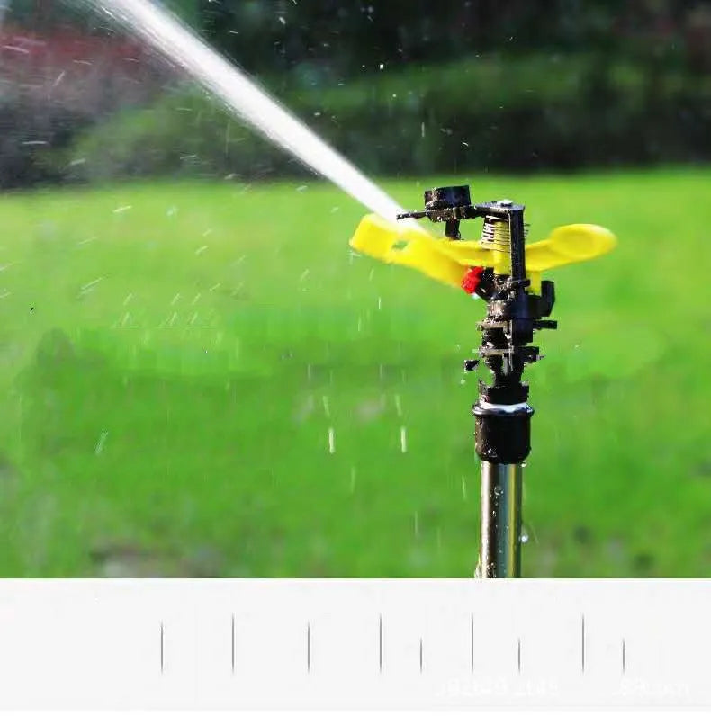 Automatic 360-degree rotating sprinkler on tripod for garden lawn irrigation with adjustable height and spray angle