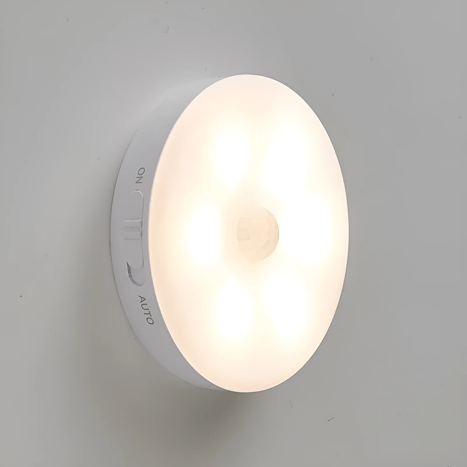 Wireless motion-activated LED light for automatic nighttime illumination in home settings