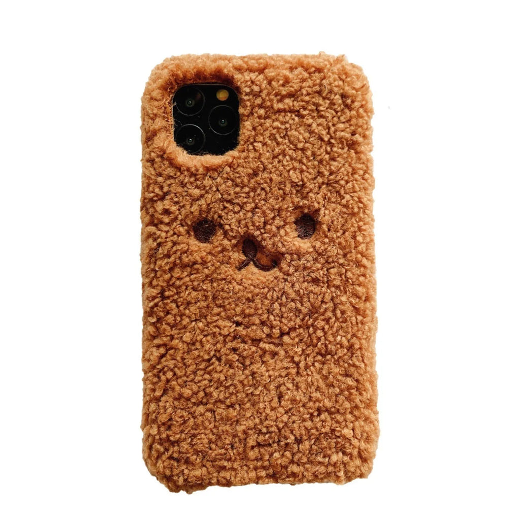 Soft TPU iPhone case with embroidered cartoon bear face in brown and white colour options