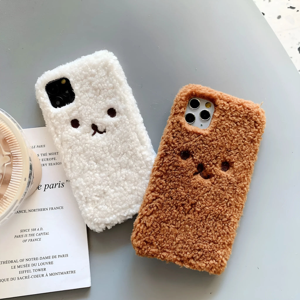 Soft TPU iPhone case with embroidered cartoon bear face in brown and white colour options