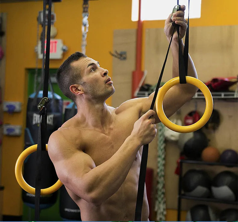 Black rubber encapsulation gymnastics training rings with ropes and gloves for indoor pull-ups and stretching exercise