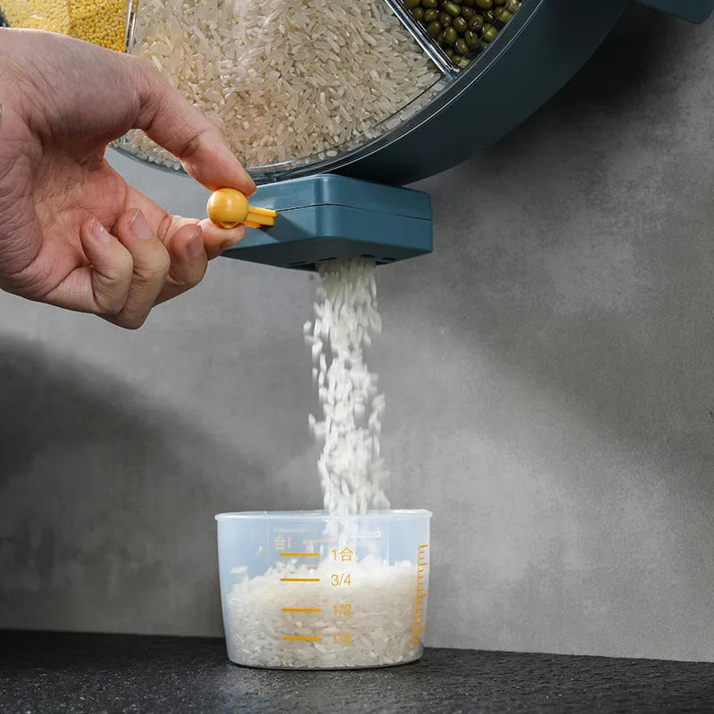 Wall-mounted rotating grain dispenser with six compartments, blue-yellow colour, press-button dispenser and clear PC top cover
