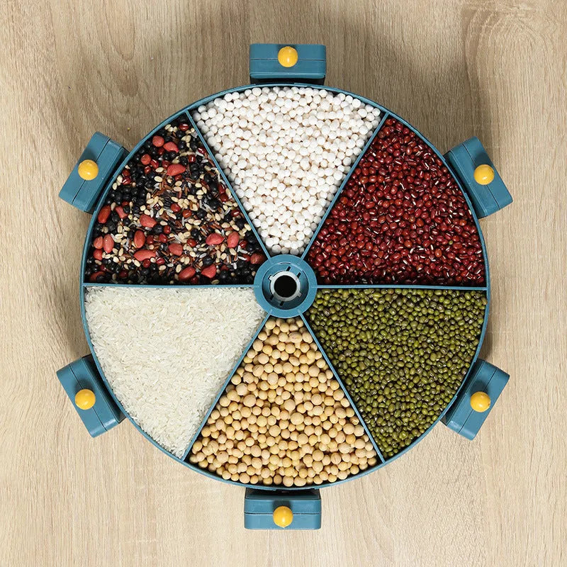 Wall-mounted rotating grain dispenser with six compartments, blue-yellow colour, press-button dispenser and clear PC top cover