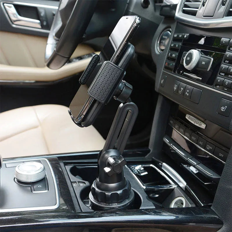 Black ABS car phone holder with 360° rotation and adjustable height mounted in vehicle