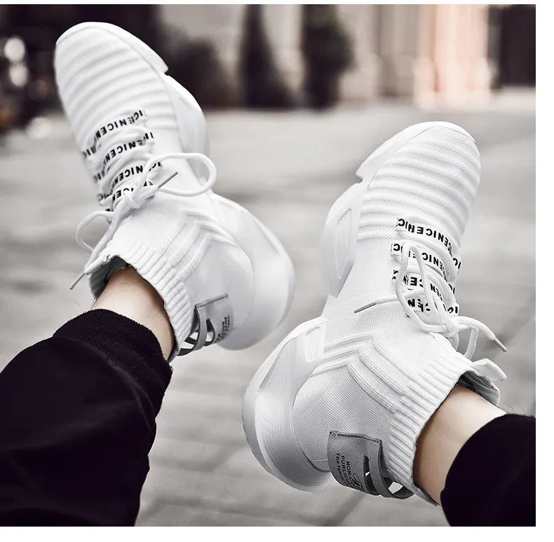 Men's black and white casual sports shoes with mesh lining in extended sizes