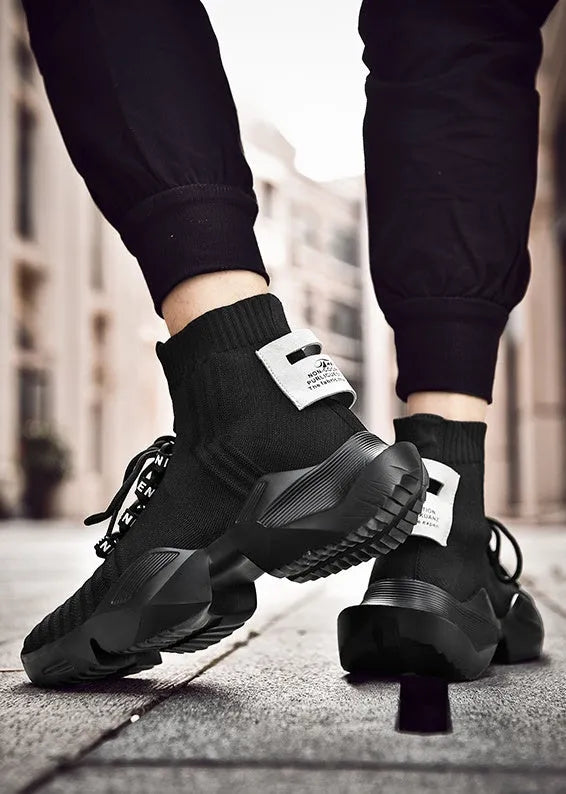 Men's black and white casual sports shoes with mesh lining in extended sizes
