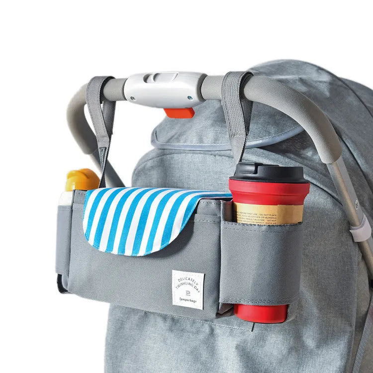 Oxford cloth hanging mommy bag with 20-35L capacity for car baby storage, in black, dark gray, sky blue, and pink tassels colours