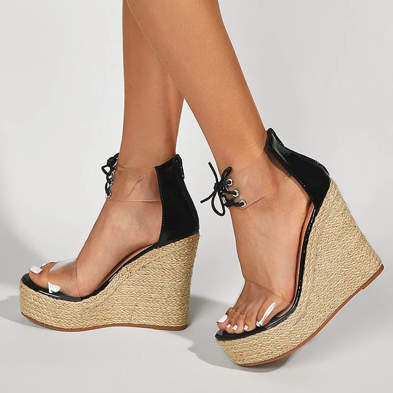 Black women's wedge sandals with hemp rope detailing on 8cm+ high wedge heel and front tie closure