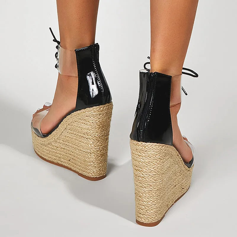 Black women's wedge sandals with hemp rope detailing on 8cm+ high wedge heel and front tie closure