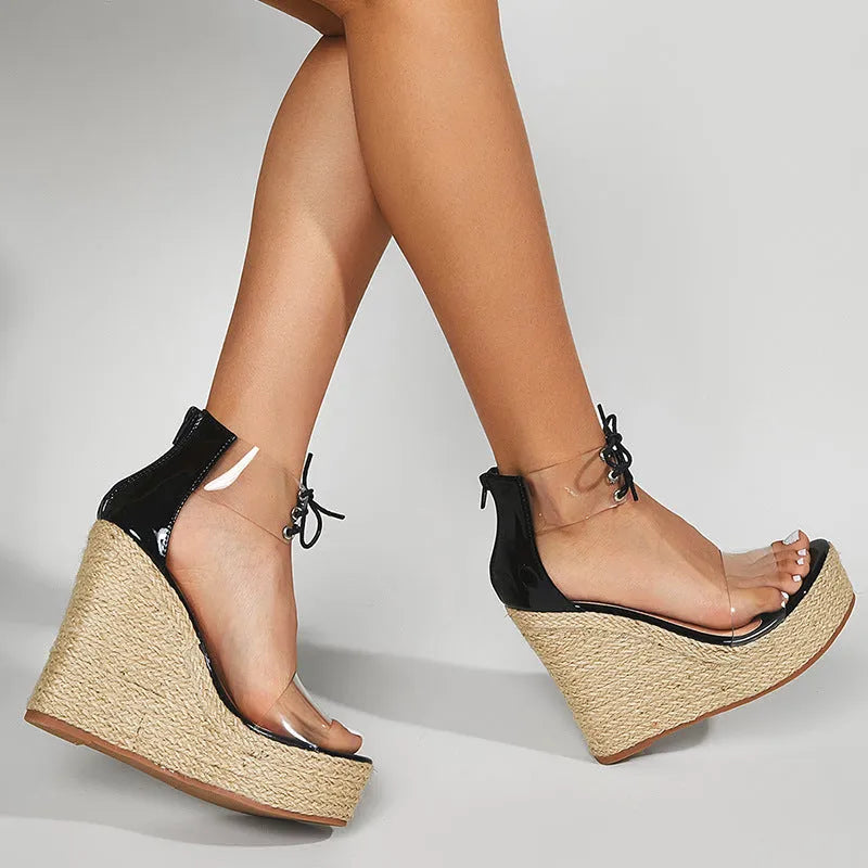 Black women's wedge sandals with hemp rope detailing on 8cm+ high wedge heel and front tie closure